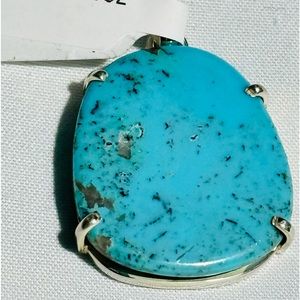 925 Sterling Silver and genuine Turquoise Pendant.